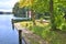 Augustow, Poland - October 04, 2019: Gate to lake Studzieniczne in autumn sunny day