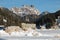 AURONZO DI CADORE, ITALY - DECEMBER 29, 2022: Beautiful view of Lago di Misurina in the Dolomites in Northern Italy with snow duri
