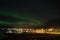 Aurora borealis above town of Hornafjordur in Iceland