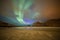 Aurora borealis on beach, Lofoten islands, Norway