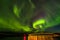 Aurora borealis, dramatic polar lights over the mountains in the North of Europe - Lofoten islands, Norway