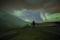 Aurora Borealis (Northern Lights) above geothermal volcanic vents in Hveravellir