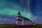 Aurora Borealis over historic Peace Lutheran Church in Saskatchewan, Canada