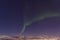 Aurora borealis over Tromso seen from Floya hill