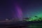 Aurora borealis polar lights and night sky stars