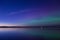 Aurora borealis reflected over a lake