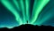 Aurora borealis and silhouette of standing man