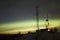 Aurora Borealis and twilight over antenna complex