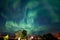 a aurora borer in the sky above an outdoor restaurant