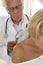 AUSCULTATION SENIOR WOMAN FOR SKIN PROBLEM