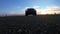 Australia - FEBRUARY 02, 2020: Jeep driving away from golden hour sun passing towards camera