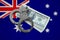 Australia flag with handcuffs and a bundle of dollars. Currency corruption in the country. Financial crimes