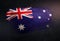 Australia Flag Made of Metallic Brush Paint on Grunge Dark Wall