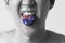 Australia flag painted in tongue of a man - indicating English language and Australian accent speaking