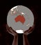 Australia on globe in hands