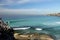 Australia: Tamarama beach city view with surfers