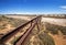 Australia â€“ Old Ghan railway bridge over a dried-out river bed at the outback desert