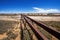 Australia â€“ Old Ghan railway bridge over a dried-out river bed at the outback desert