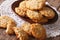 Australian ANZAC biscuits close up on a plate. horizontal