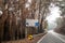 Australian bushfires: burnt road sign and eucalyptus trees