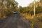 Australian Dirt Road with Parked Car in Sunset