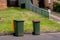 Australian garbage wheelie bins with colourful lids