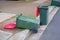 Australian garbage wheelie bins red lids for general waster stay and lie down on the street kerbside after council collection