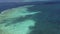 Australian great barrier reef aerial from helicopter shadows