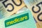 Australian Medicare Card over Blurred Money Background