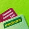 Australian Medicare and Pensioner Concession Cards over Vibrant Green Background