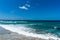 Australian ocean beach with people bathing