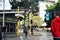 Australian people walking crossing traffic road at St Georges Terrace street