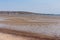 An Australian Sandy Beach With The Tide Out