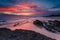 Australian seascape at sunrise with rich in red color