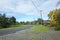 An Australian suburban quiet neighbourhood street with electricity poles along the road. Werribee, VIC Australia