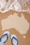 Australian textured map in wet sand on the beach