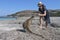 Australian woman petting a Kangaroos in Lucky Bay Western Australia