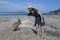 Australian woman petting a Kangaroos in Lucky Bay Western Australia