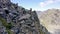 Austria. Alpine region `Stubai`. Climbers on a mountain path.