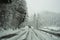 Austria. Driving shot, driver point-of-view. Footage driving on road during a snowfall