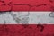 Austria flag painted on the cracked grunge concrete wall