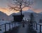 AUSTRIA, GASTEIN - January 1, 2023: perchten walk along the country road against the backdrop of dawn