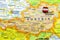 Austria national flag pinned on Europe map. Macro Close up picture of country on a colorful and Blurry World Map Globe