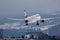 Austrian Airlines plane approaching airport Innsbruck Airport, INN