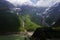 Austrian alps landscape of moutains and lake in Kaprun