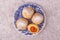 Austrian and czech sweet dessert knedle apricot dumplings on gray concrete background. Filled cottage cheese dough. top view