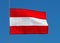 Austrian flag in wind against the sky