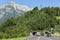 Austrian highway with cars leaving a tunnel through a mountain