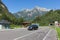 Austrian highway with cars leaving a tunnel through a mountain