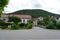 Austrian houses in rural place with red tiled roofs.